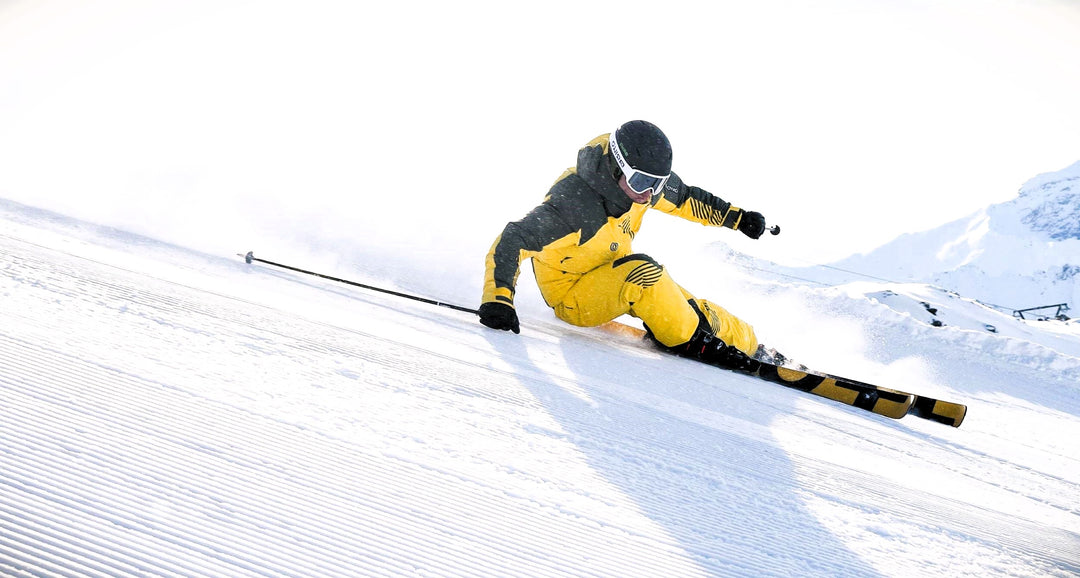 ISIA Professional Ski Instructor Julian Paul arcing perfect GS turn during test programm for ski company ORIGINAL+